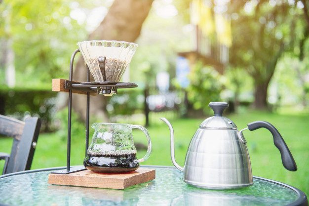 making-drip-coffee-vintage-coffee-shop-with-green-garden-nature_1150-14516-1.jpg