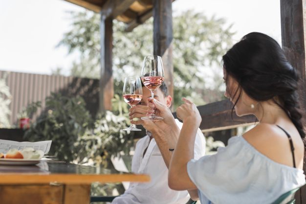 young-couple-toasting-wine-glasses-garden_23-2147923042-1.jpg